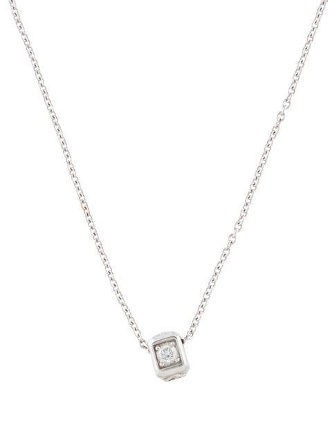 18K Diamond Mimioui Solitaire Pendant Necklace.